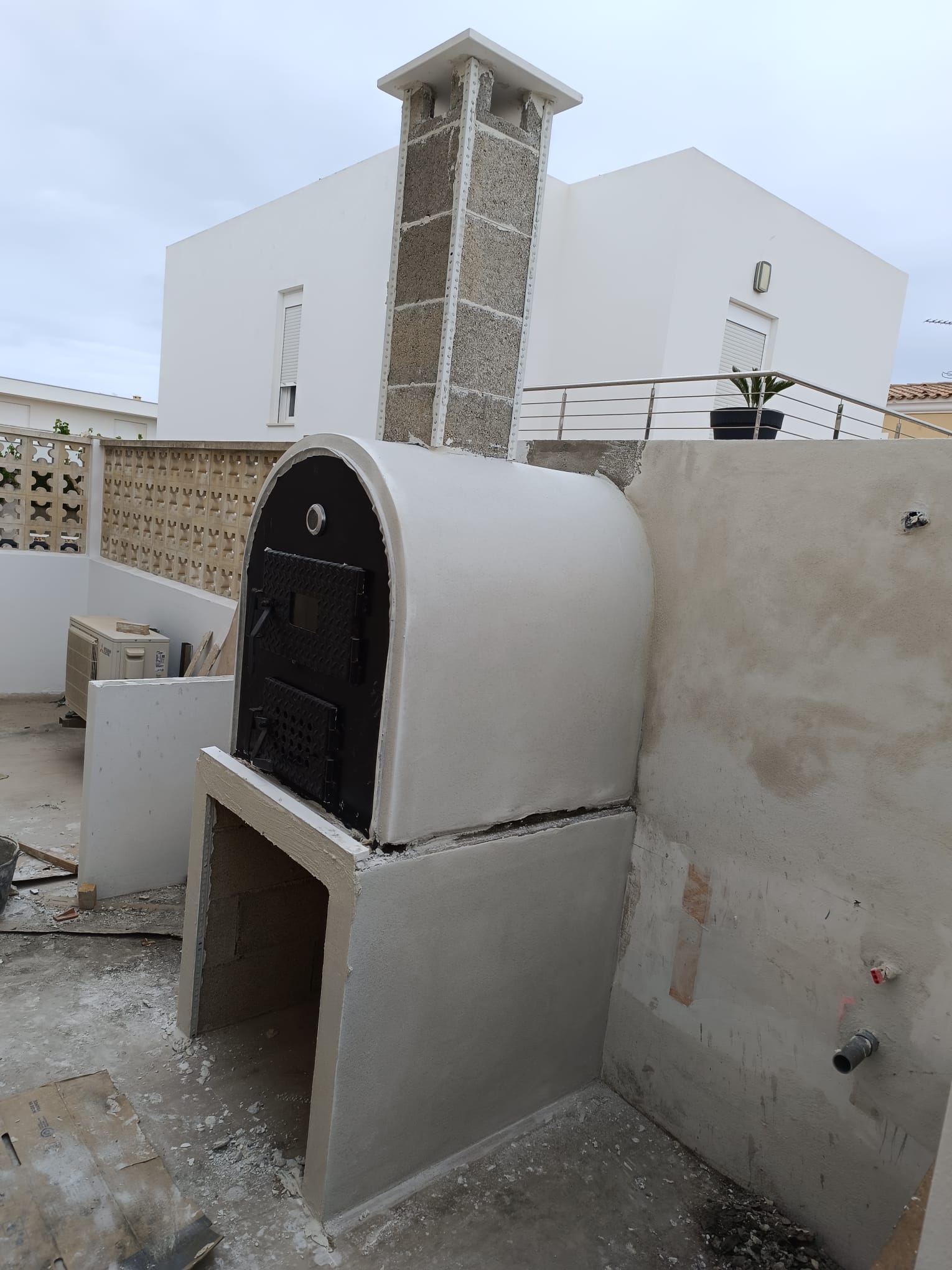 Construcción de horno y barbacoa