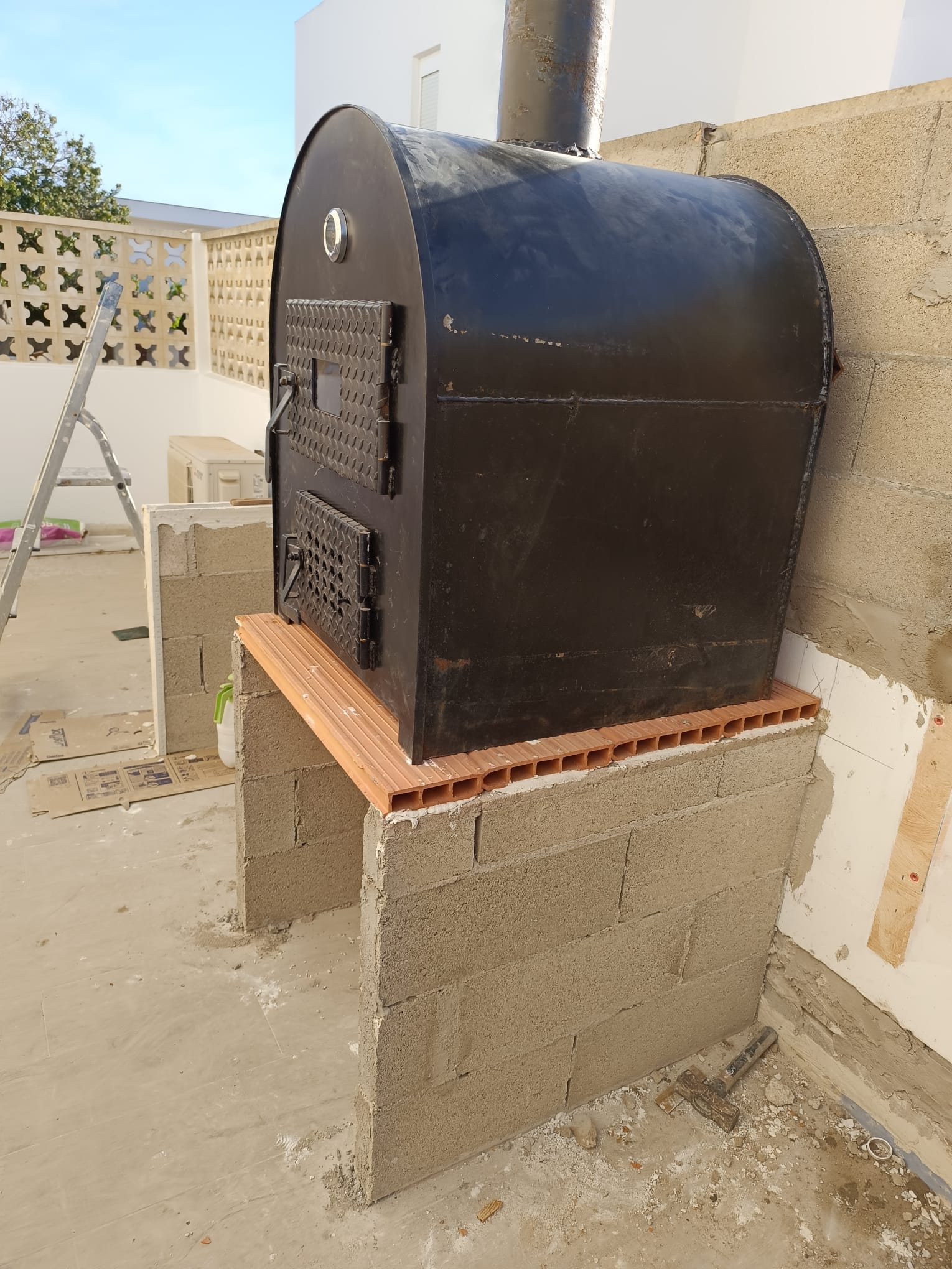 Construcción de horno y barbacoa