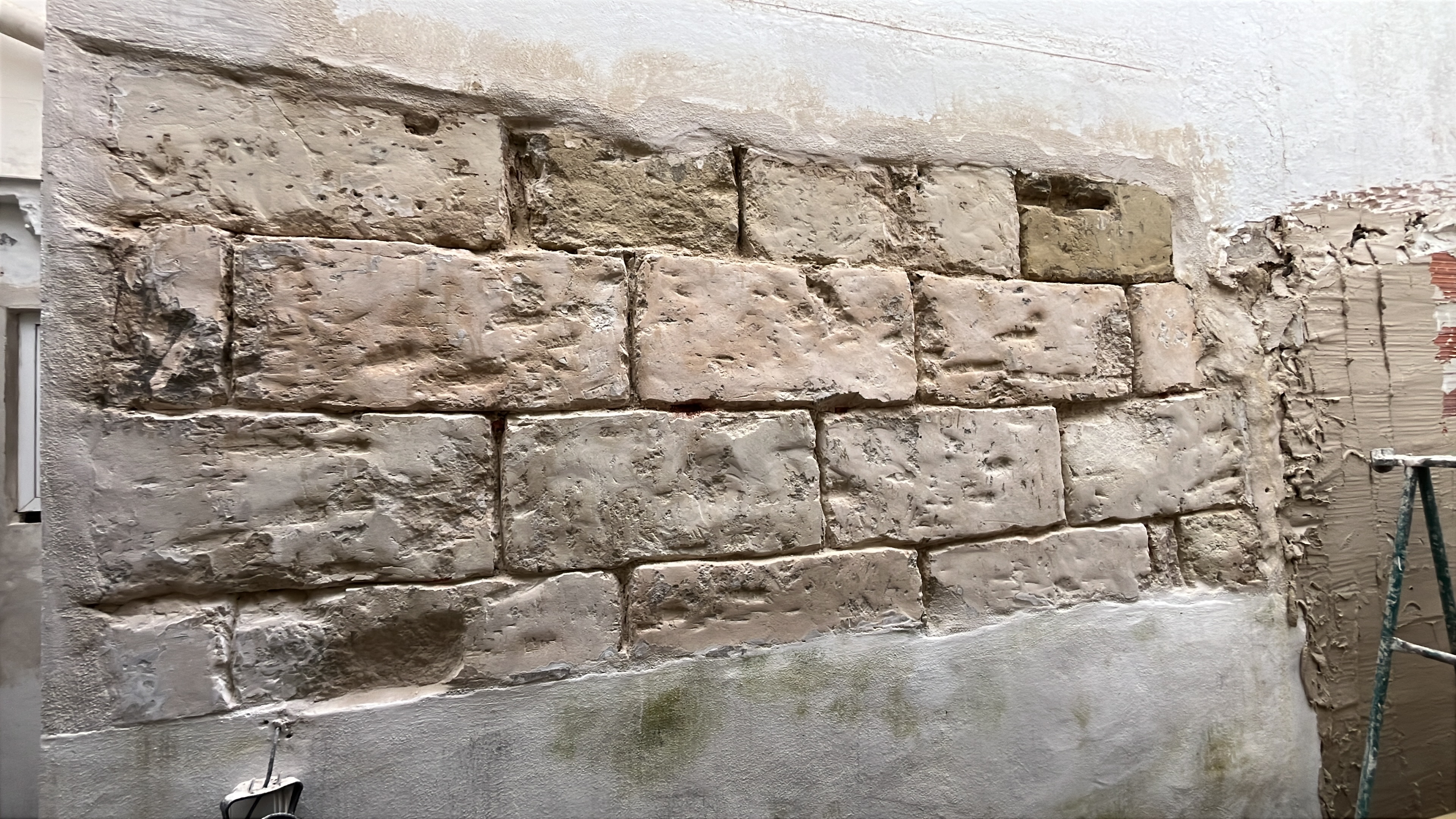 Restauración de pared de piedra